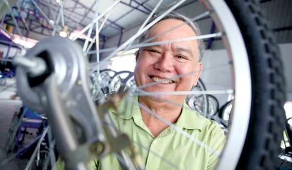 An nhiên lăn trên bánh xe cuộc đời