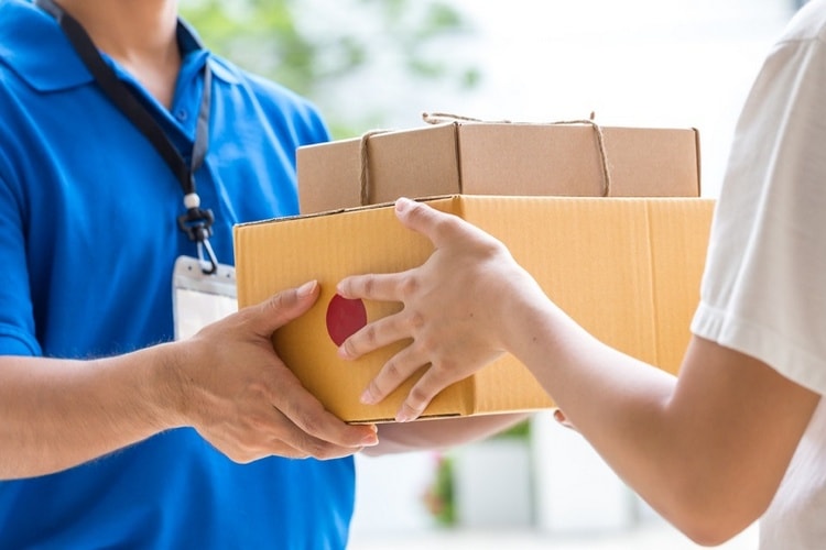WHO: Covid-19 ít rủi ro lây lan qua việc giao nhận hàng hóa