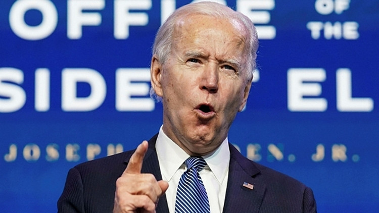 Tổng thống Biden nói không có bằng chứng DN sẽ rời Mỹ nếu ông tăng thuế. Ảnh: Reuters