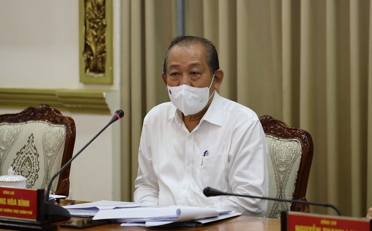 [Caption]Phó thủ tướng thường trực Trương Hòa Bình yêu cầu TP.HCM triển khai các biện pháp, quyết tâm dập dịch trong 2 tuần