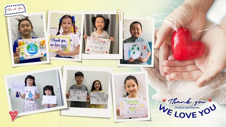 Các học viên của ILA chụp ảnh cùng thông điệp “Thank you! We love you” để tri ân các chiến sĩ áo trắng