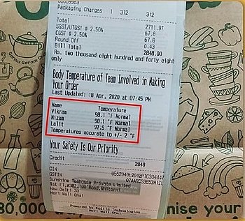 Hoá đơn tính tiền có ghi thân nhiệt của nhân viên tại cửa hàng của Chaayos