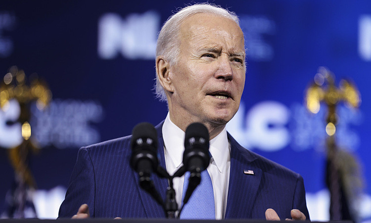 Tổng thống Biden trong một sự kiện ở thủ đô Washington hôm 14/3. Ảnh: Reuters.