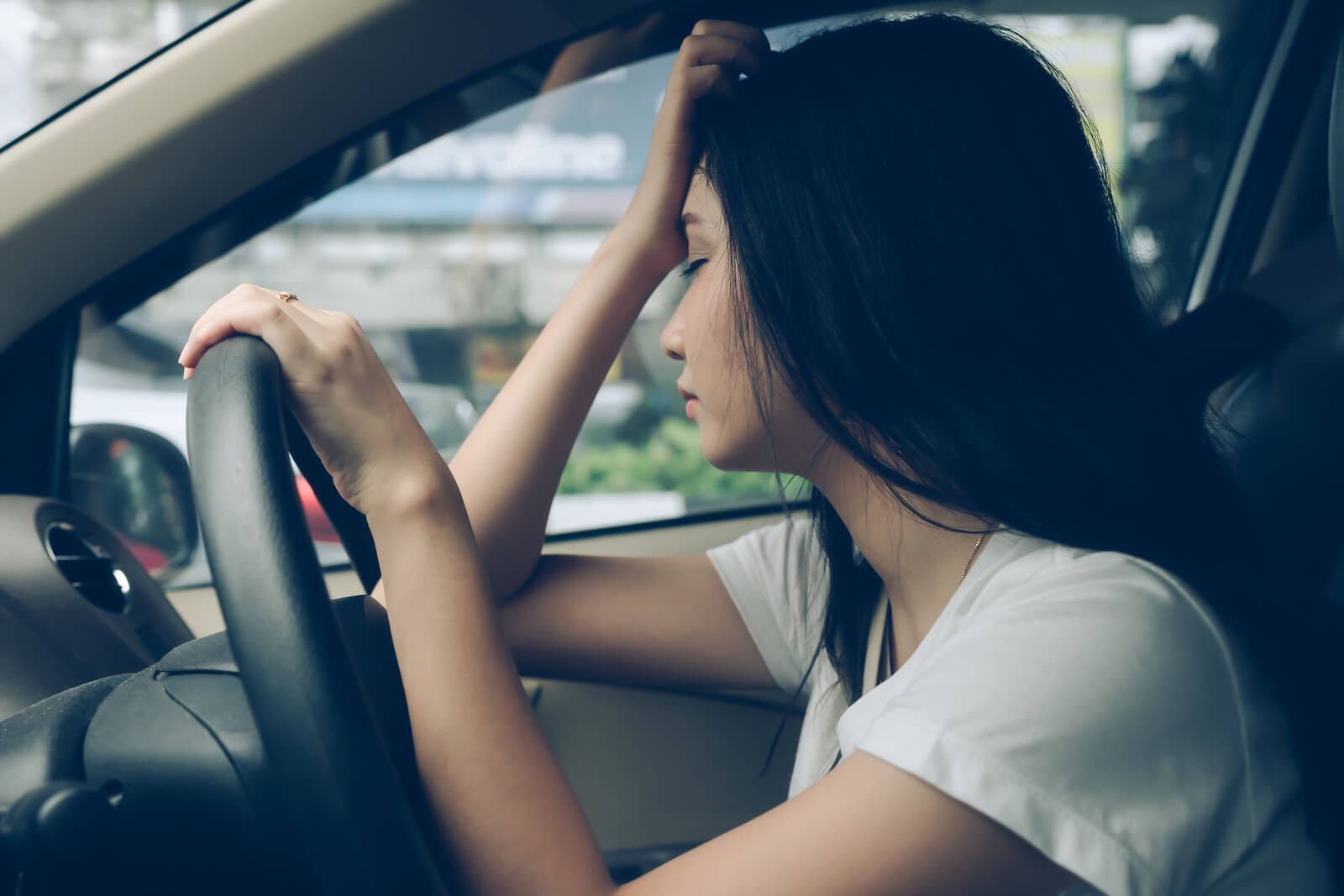 www.insurethebox.com-wp-content-uploads-2019-01-_bigstock-stressed-woman-driver-sitting-249545728.jpg