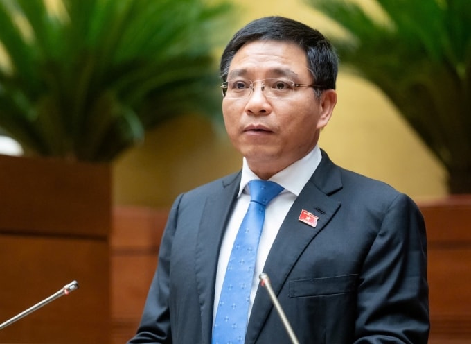 Bộ trưởng Tài chính Nguyễn Văn Thắng trình bày tờ trình dự Luật Ngân sách Nhà nước (sửa đổi), chiều 14/5. Ảnh: Trung tâm báo chí Quốc hội