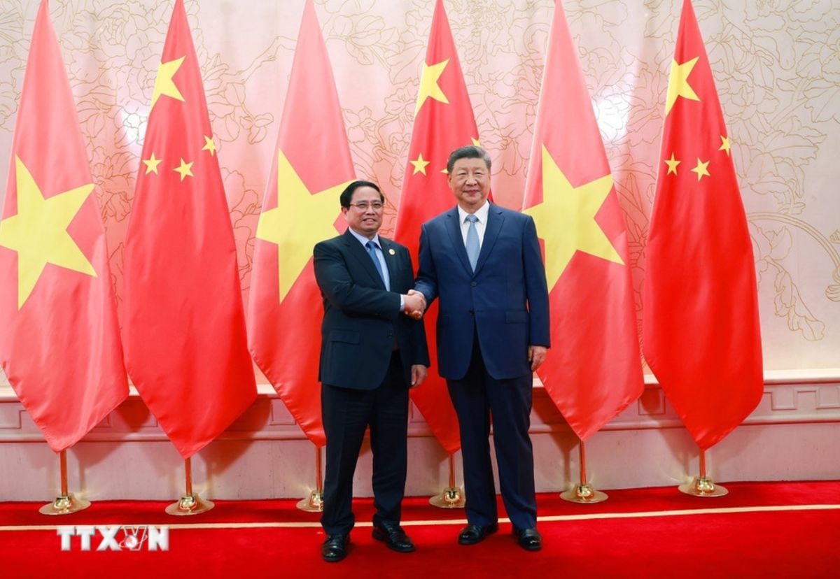 Thủ tướng Chính phủ Phạm Minh Chính hội kiến Tổng Bí thư, Chủ tịch nước Trung Quốc Tập Cận Bình. Ảnh: TTXVN