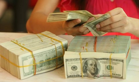 Chưa cân đối cung, cầu USD