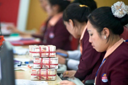 Việt Nam và Lào ký thỏa thuận tăng cường hợp tác tài chính