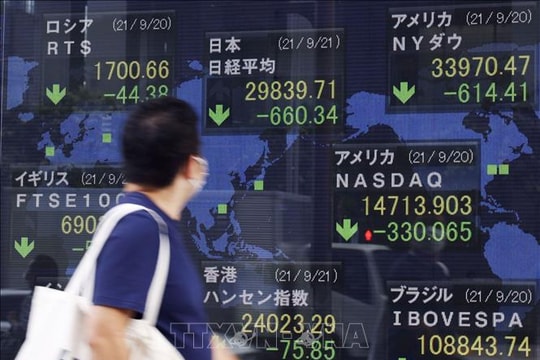 Tín hiệu nới lỏng từ Fed thắp sáng thị trường chứng khoán châu Á Tín hiệu nới lỏng từ Fed thắp sáng thị trường chứng khoán châu Á